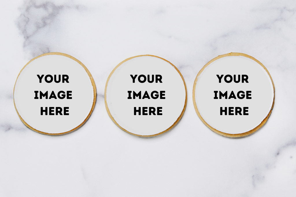 Three sugar cookies with "Your Image Here" printed in frosting
