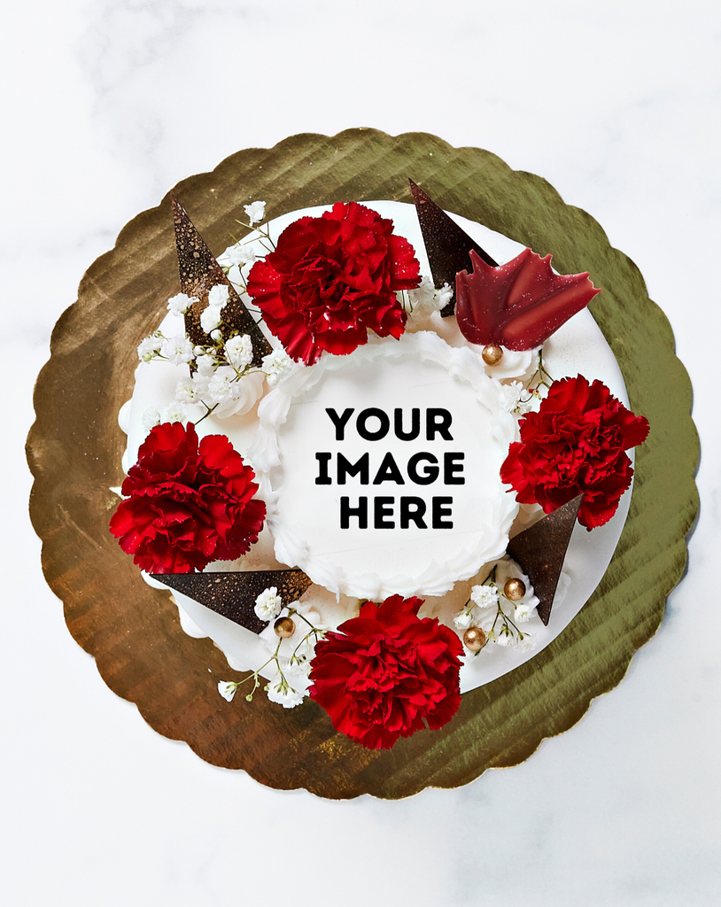 Top of cake with fresh red flowers and a "Your Image Here" notice